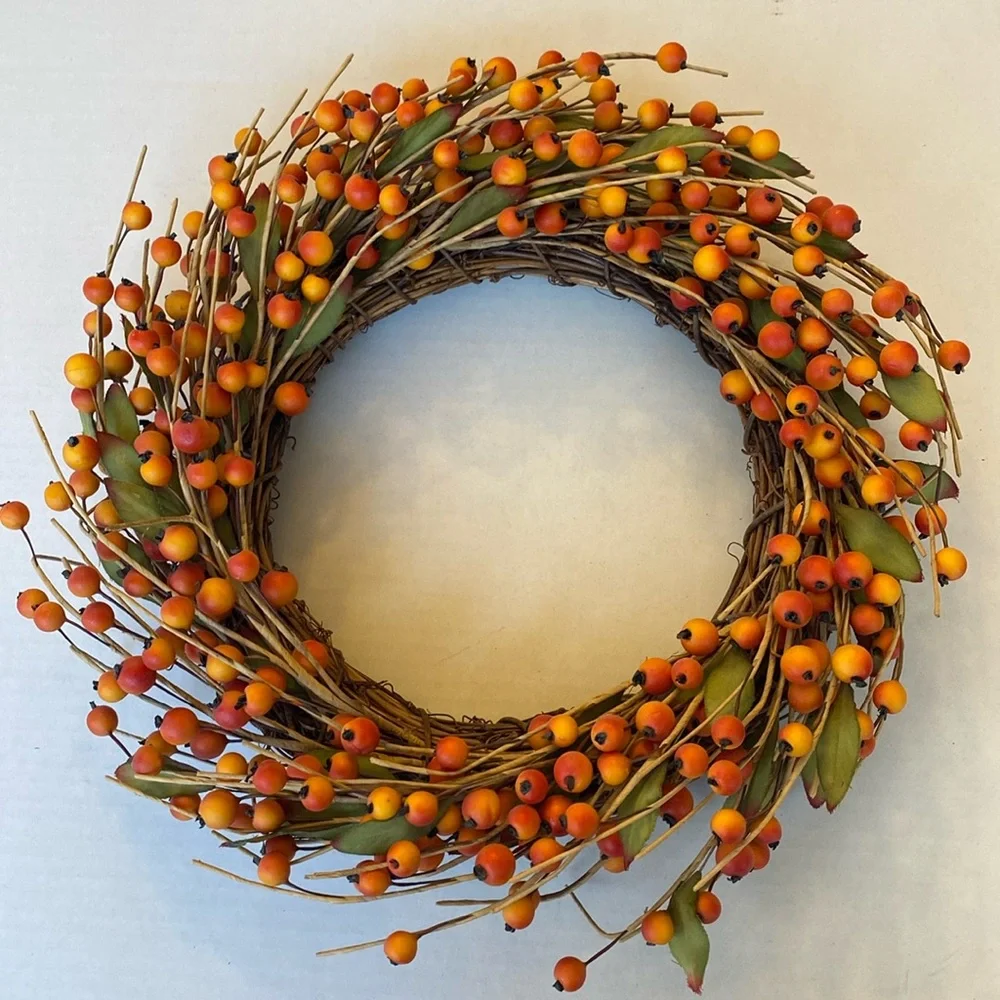 Autumn Fall Orange Faux Berries Wreath with Leaf accents. Brown twig backing.